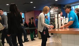 people in line at a coffee shop