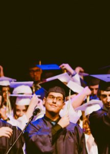 college graduates at a ceremony